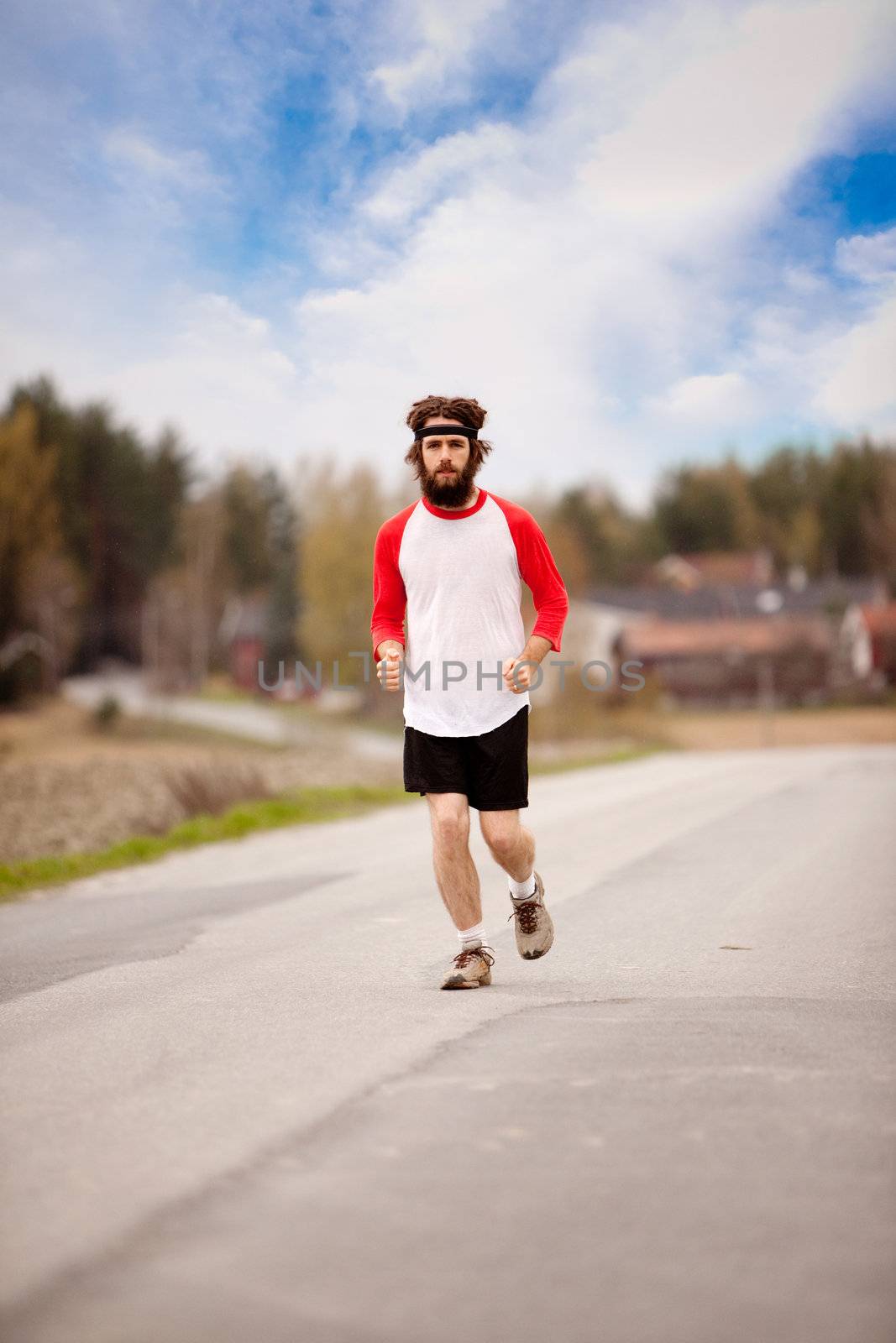 A retro style running in the country on a road