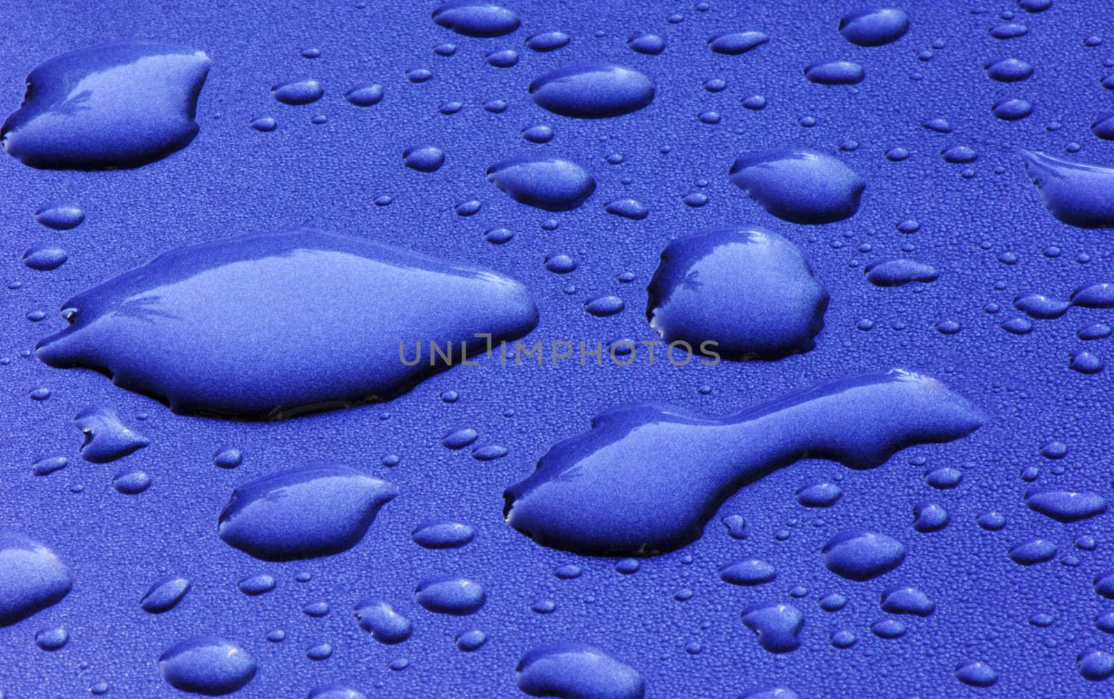 Image shows droplets on a metallic surface, following a rainstorm