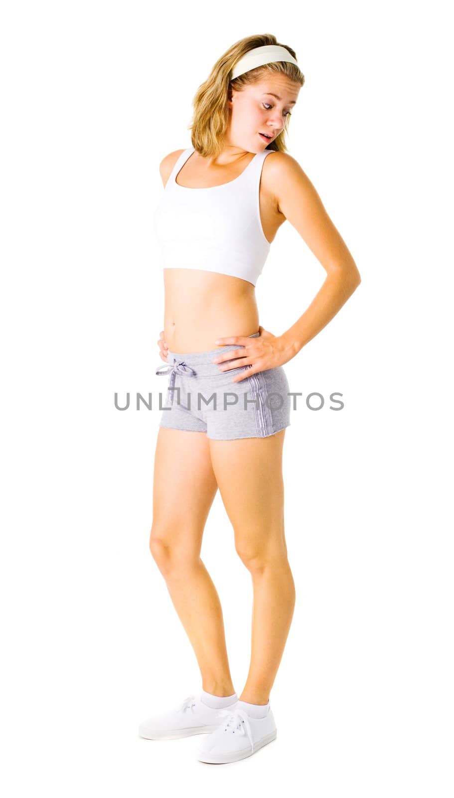 Young woman working out on a white background, from a complete series.