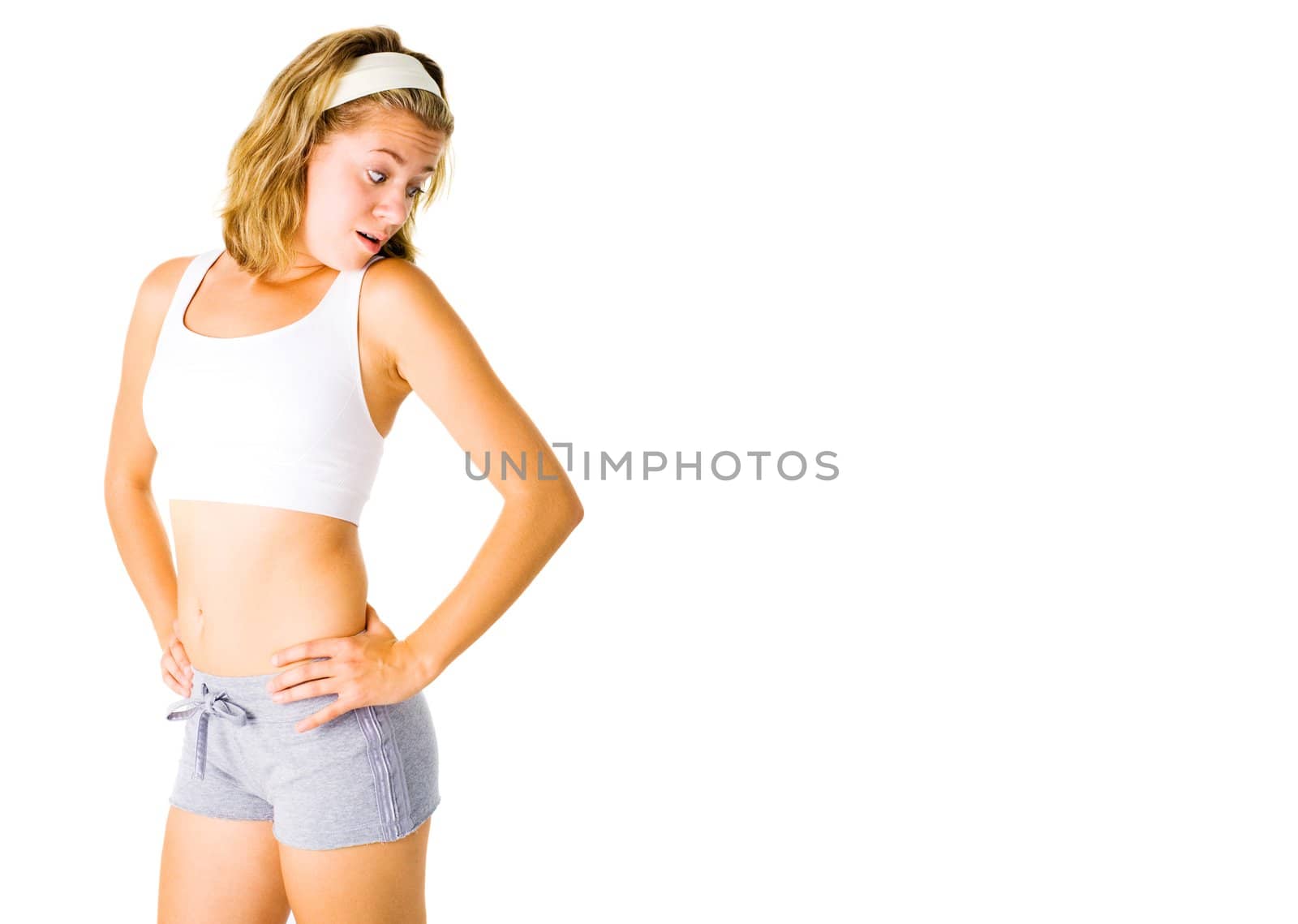 Young woman working out on a white background, from a complete series.