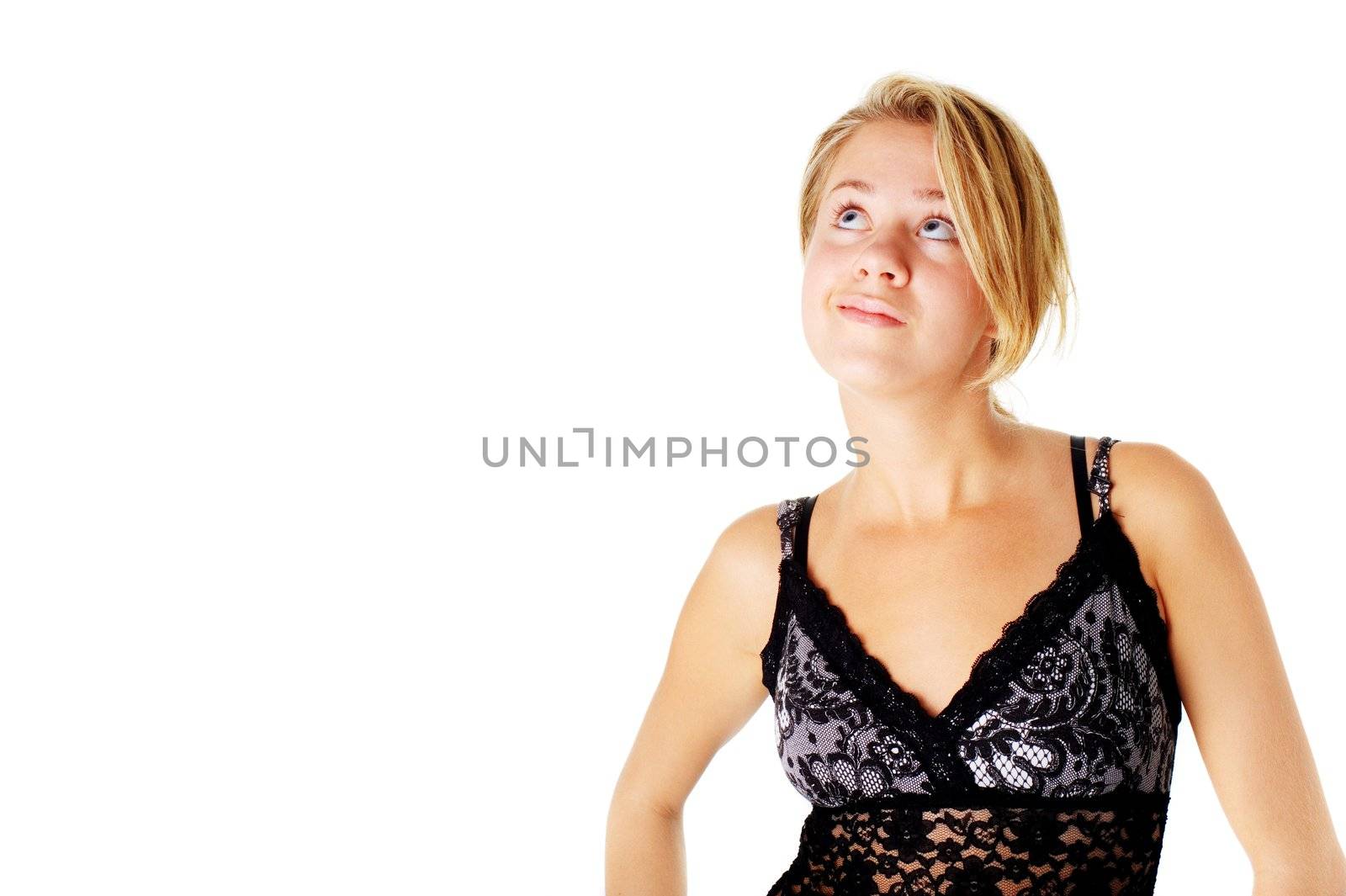 Young woman in a dress posing against a white background.