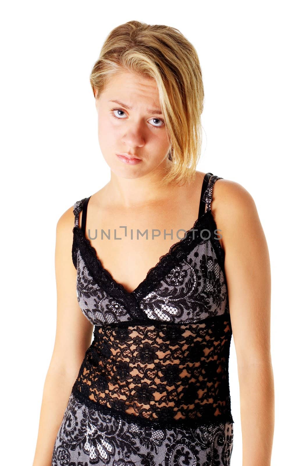 Sad girl in a dress, against a white background.