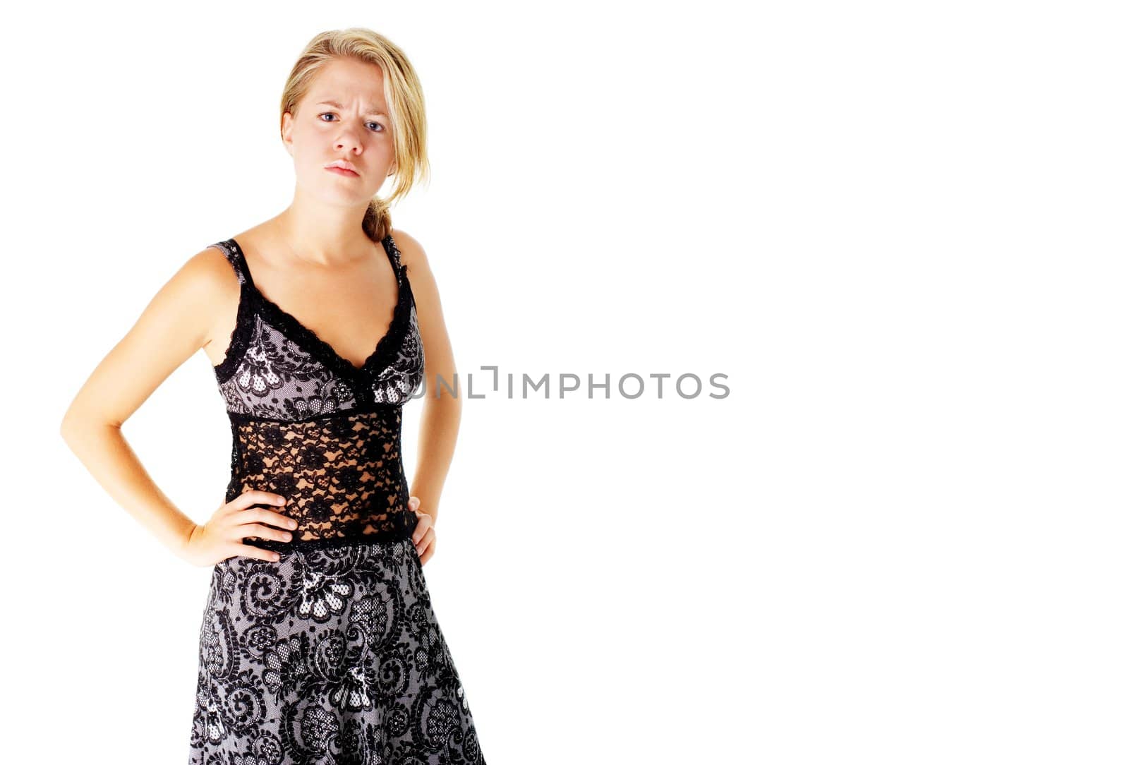 Angry womane in a dress on a white background.