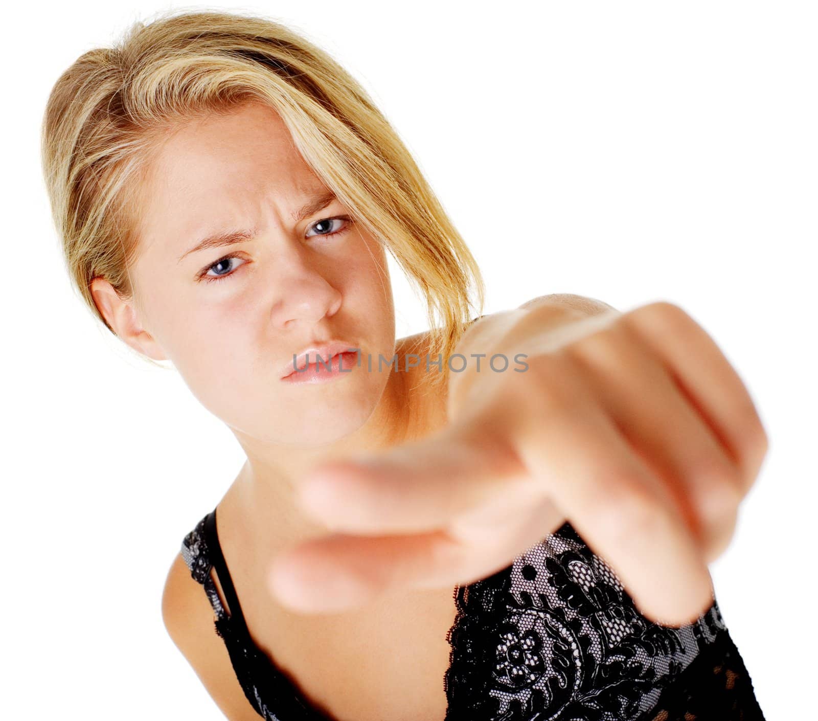 Angry womane in a dress on a white background.