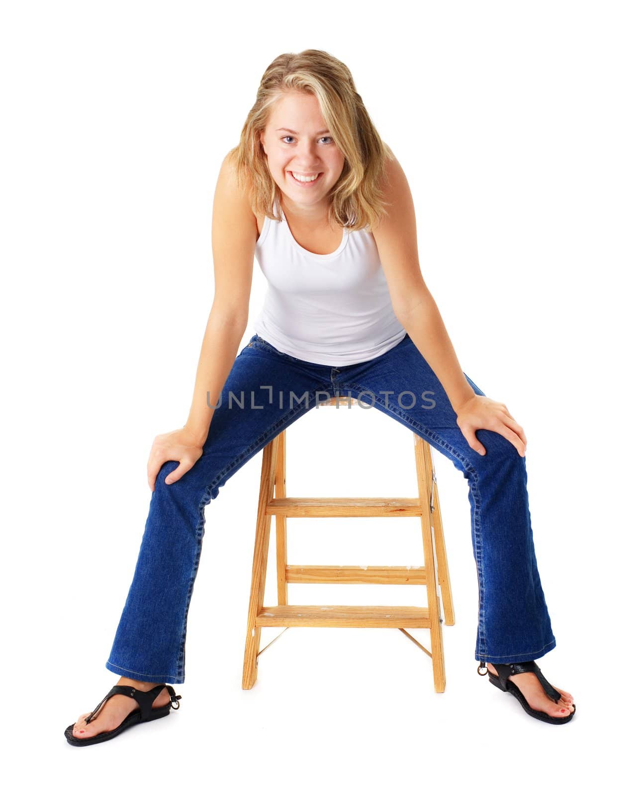 Casual Woman Sitting On A Small Ladder by cardmaverick