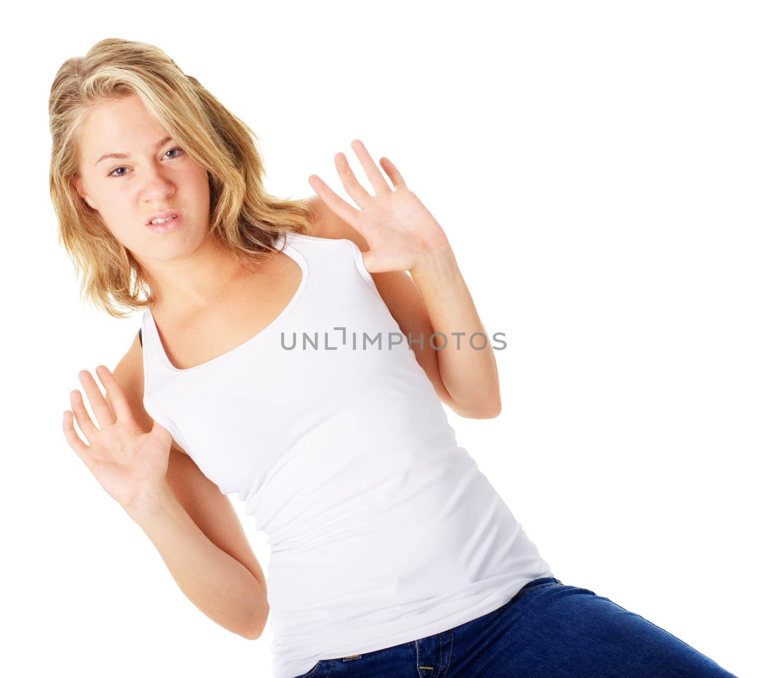 Young woman with an attitude problem, isolated on white.