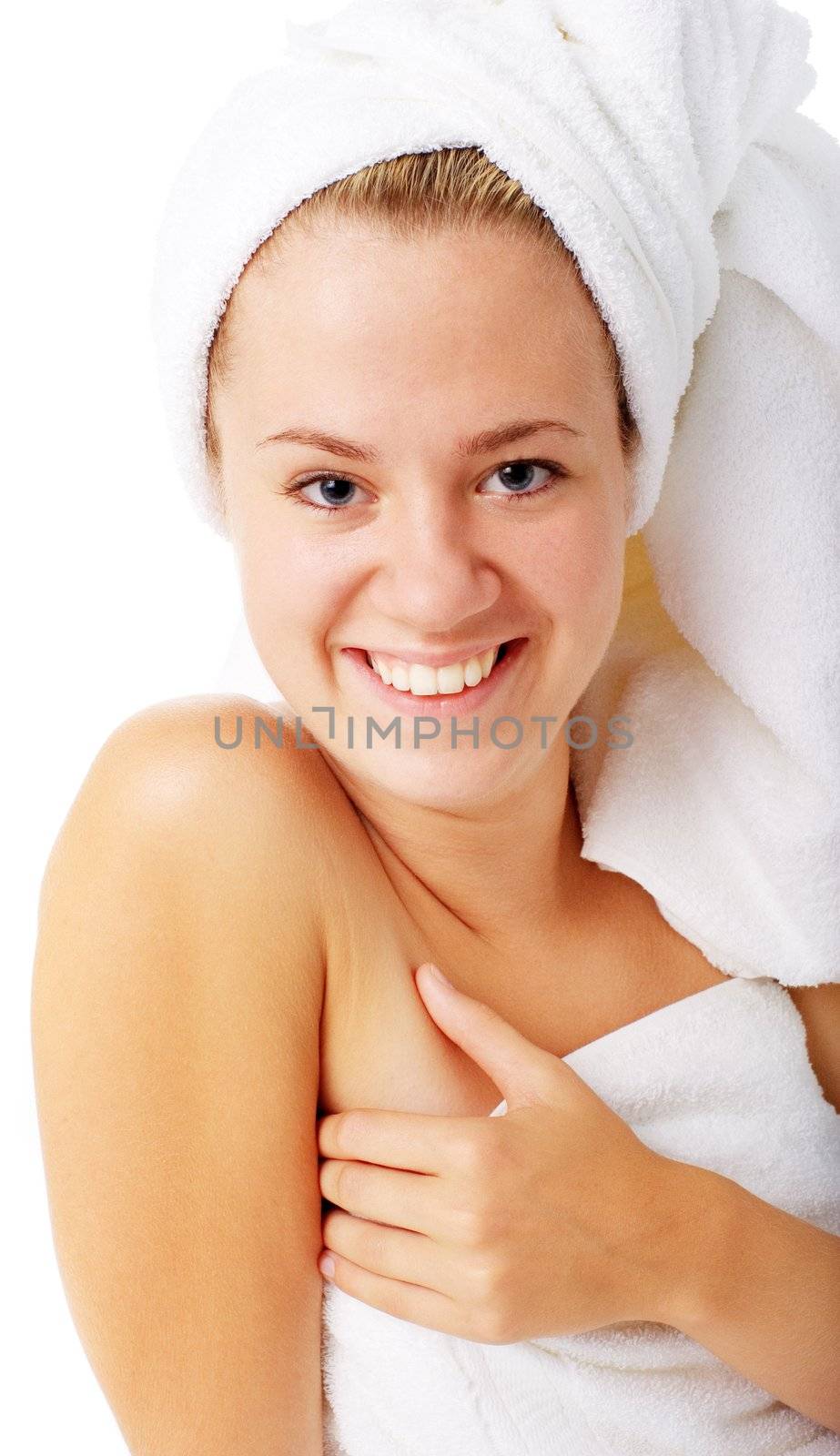 Beautiful young spa woman on white, from a complete series of photos.