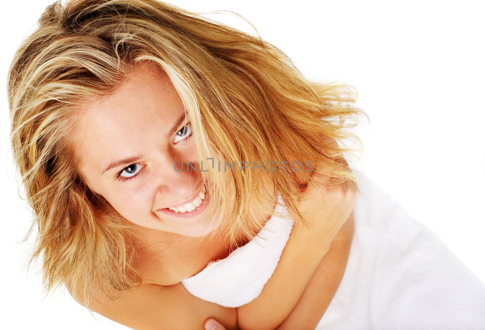 Beautiful young spa woman on white, from a complete series of photos.