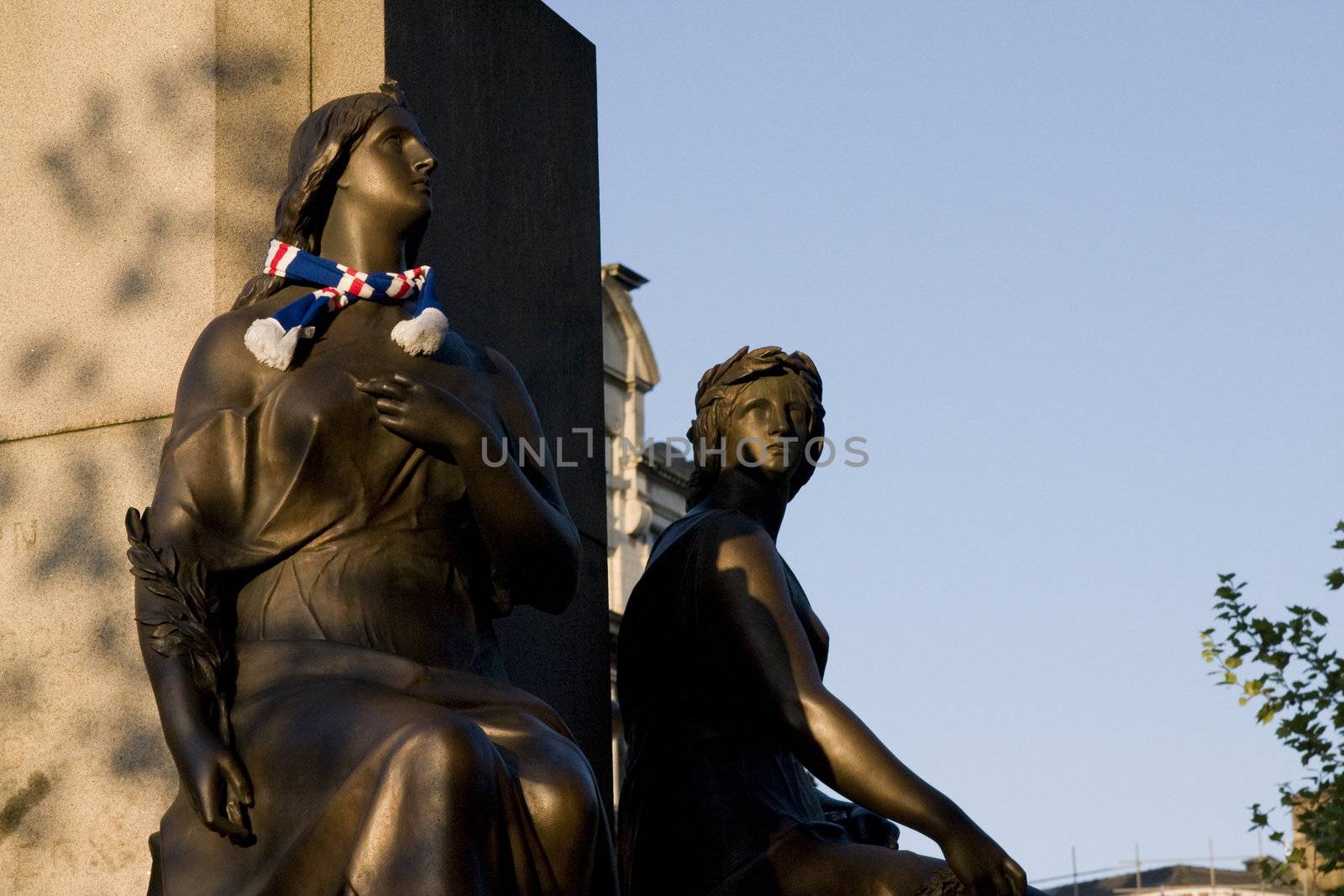 Rangers fan placed a scarf on a statue on Manchester Piccadilly