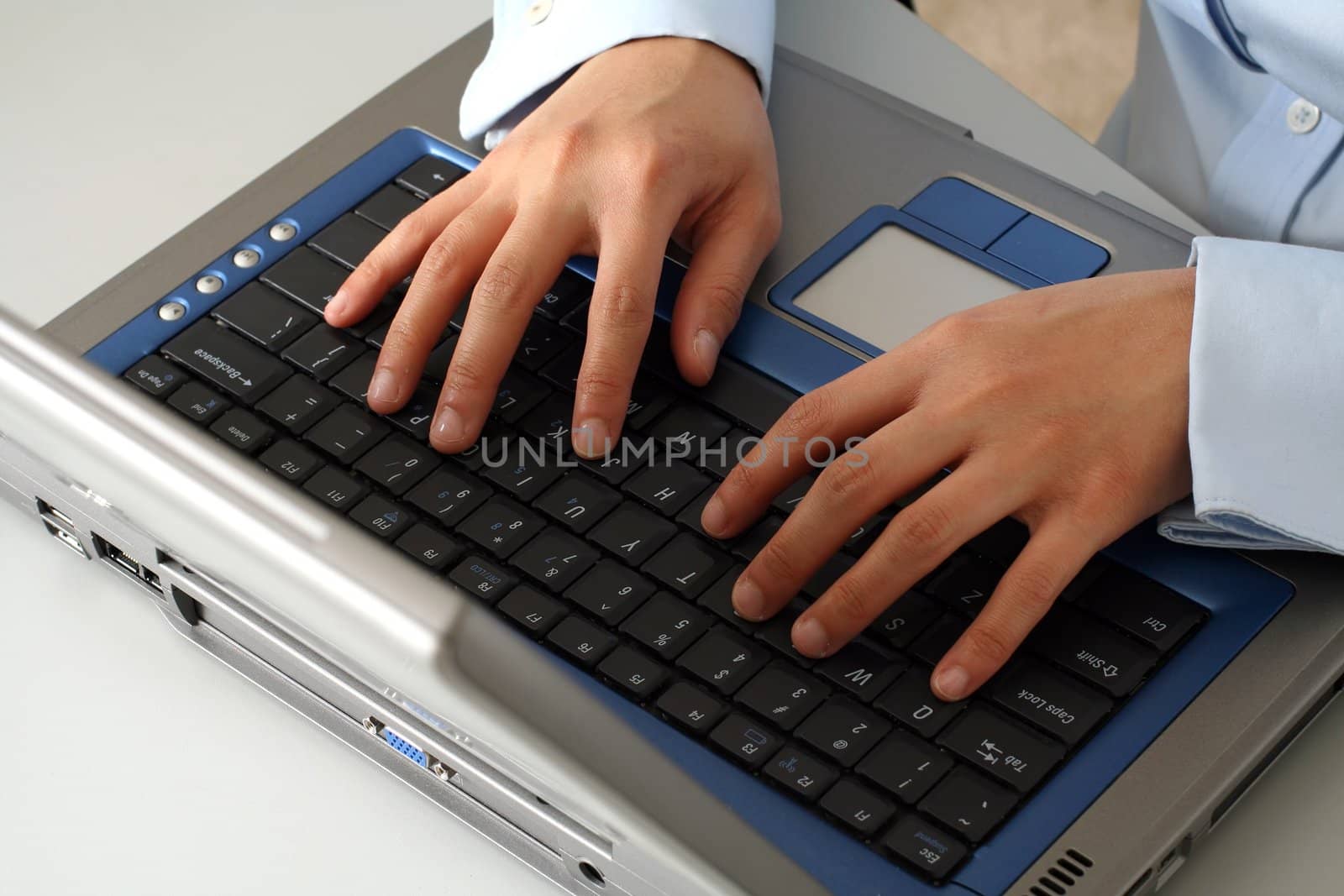 Businesswoman hands on laptop