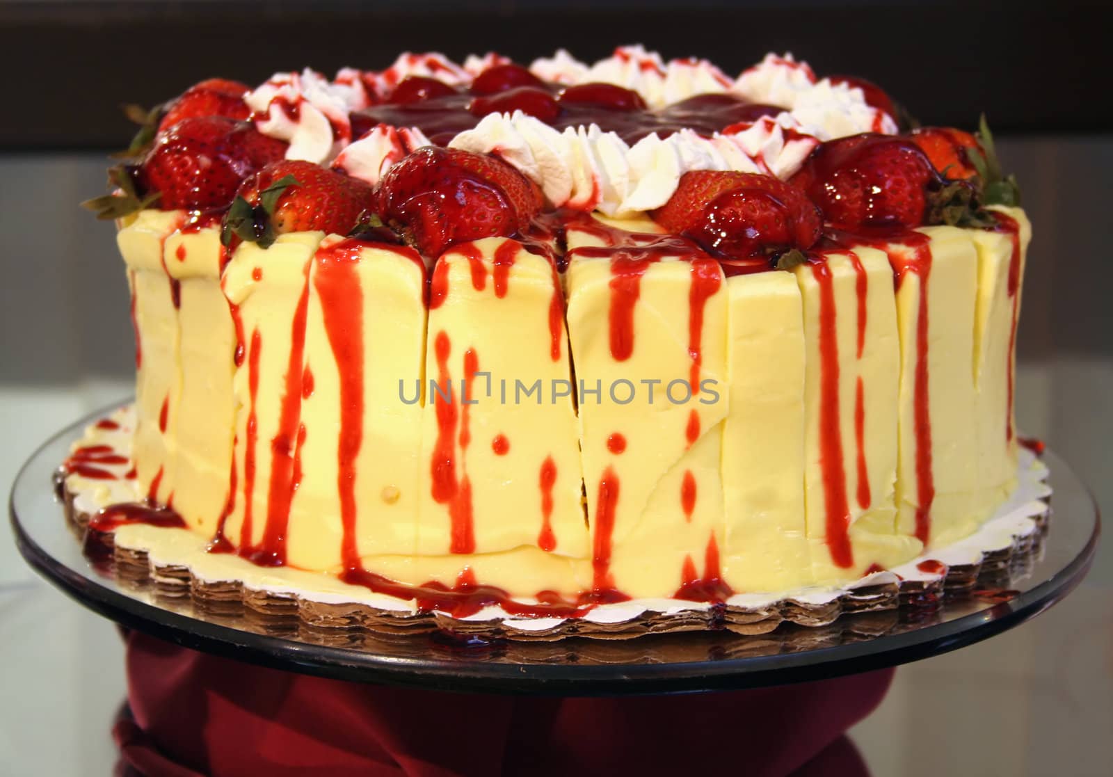 Strawberry cake on cake plate


