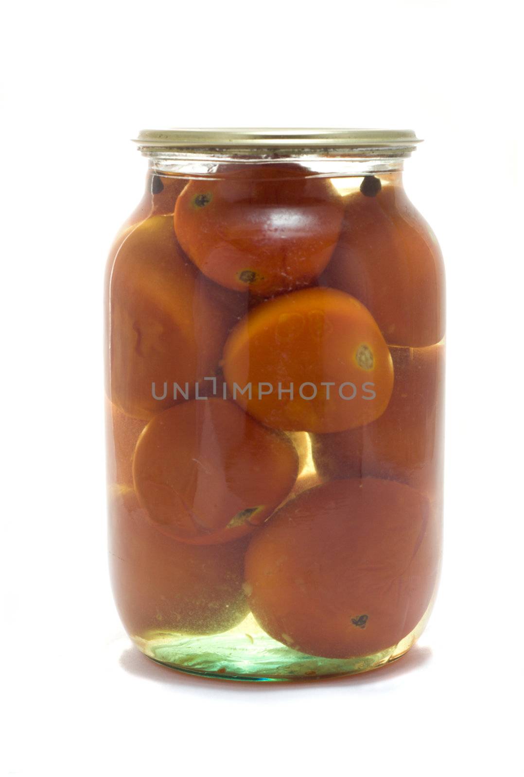glass jar with preserved tomatos, isolated on white