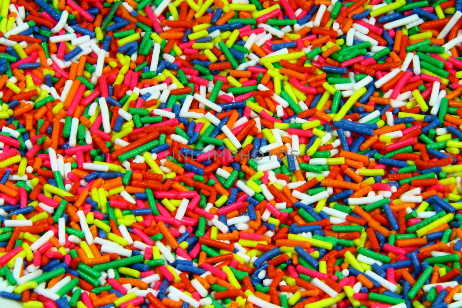 fine multi colored candy sprinkles as background
