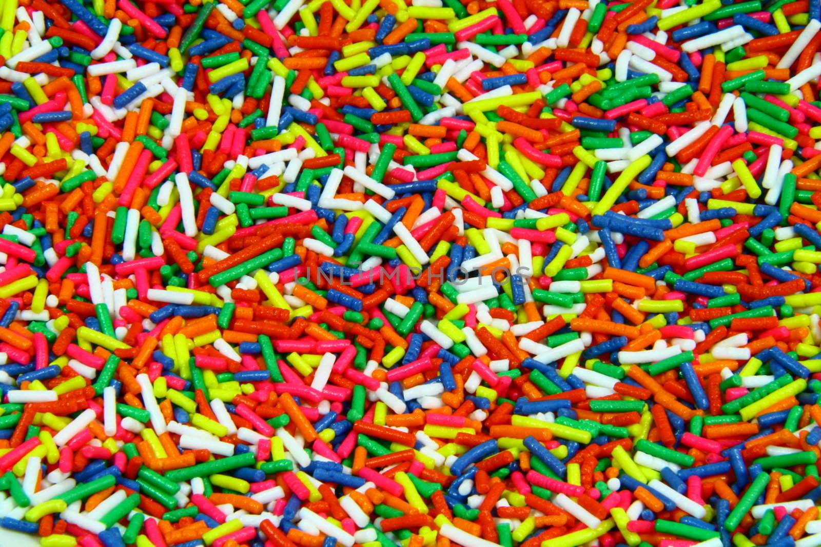 fine multi colored candy sprinkles as background
