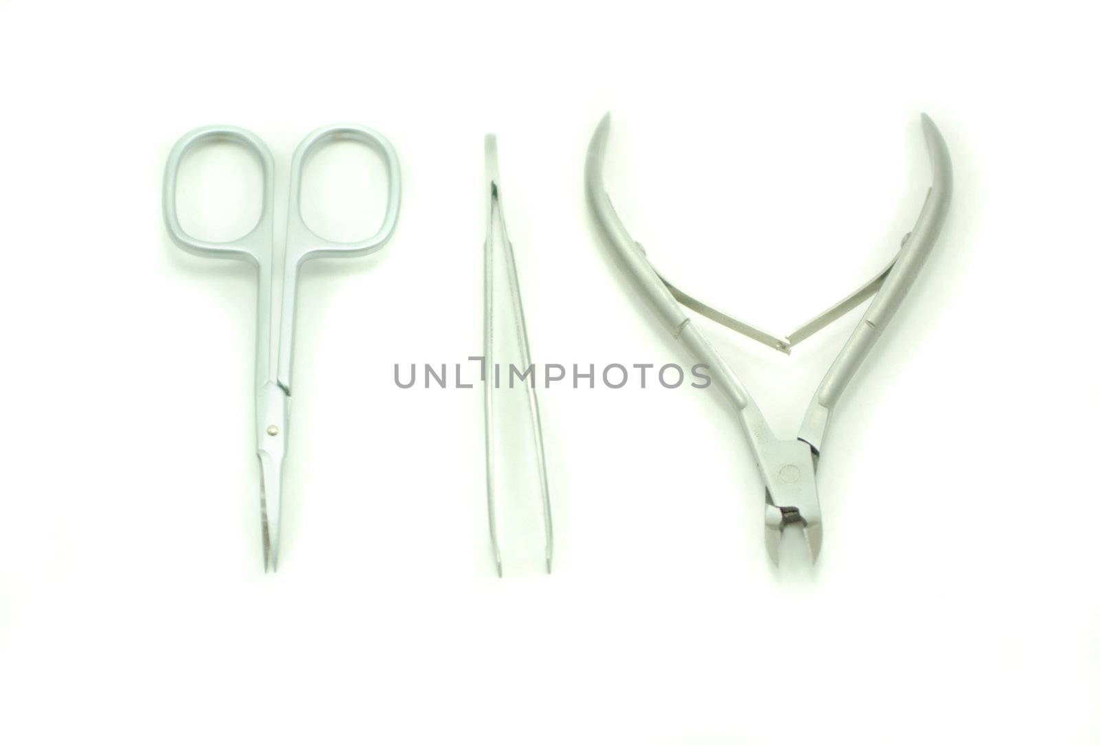 nail scissors set with three items isolated on white