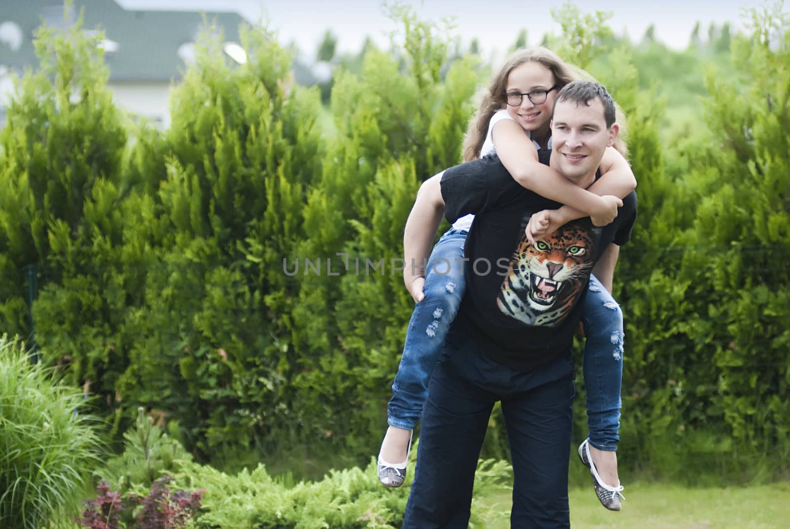 Portrait of happy couple relaxing on nature