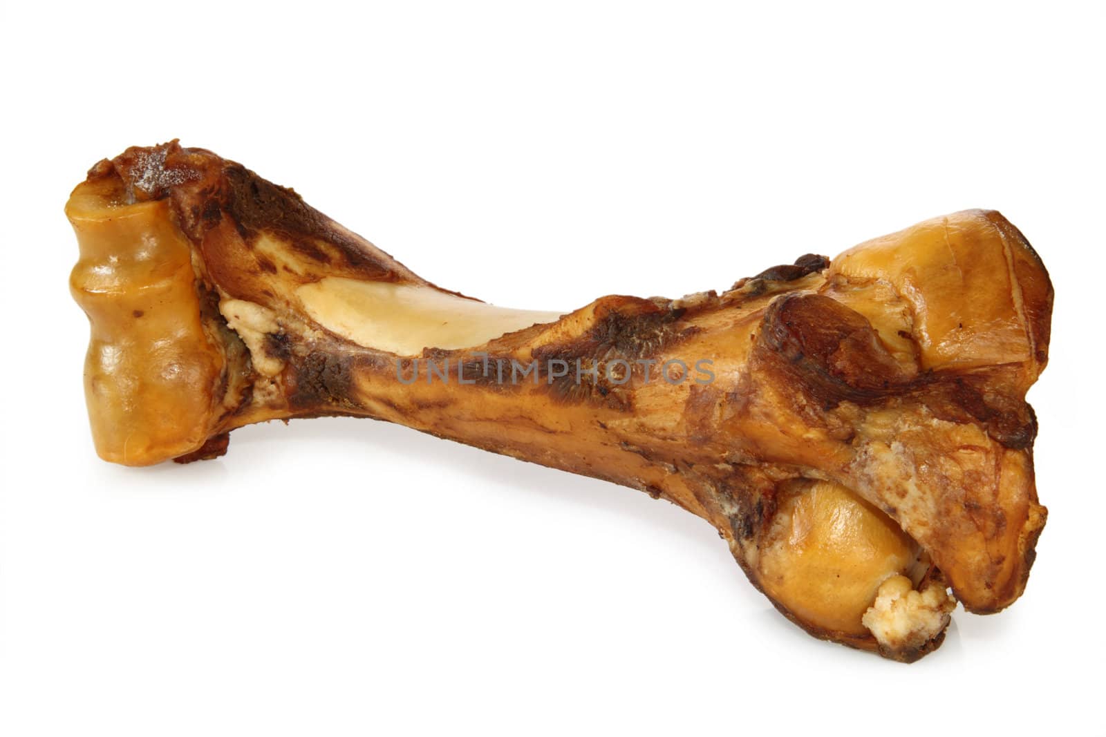 Smoked dog bone, isolated on a white background.