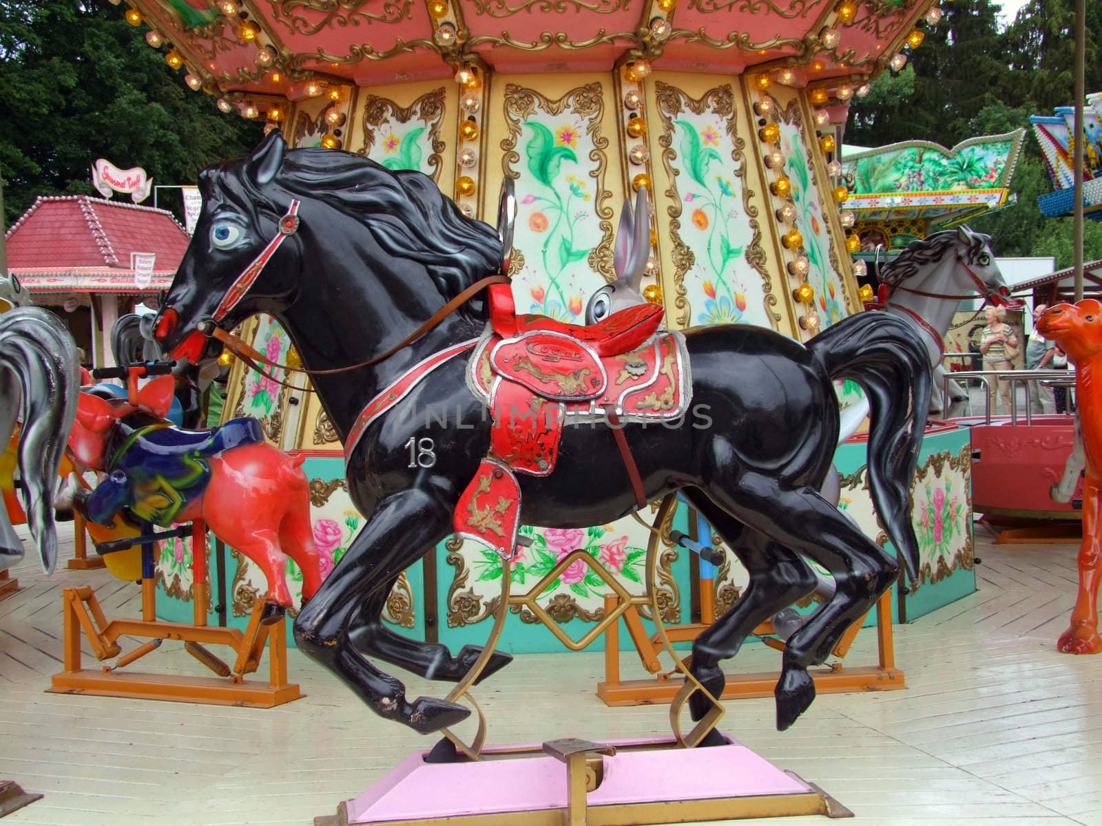 Black carnival carousel Horse. Shot outdoor