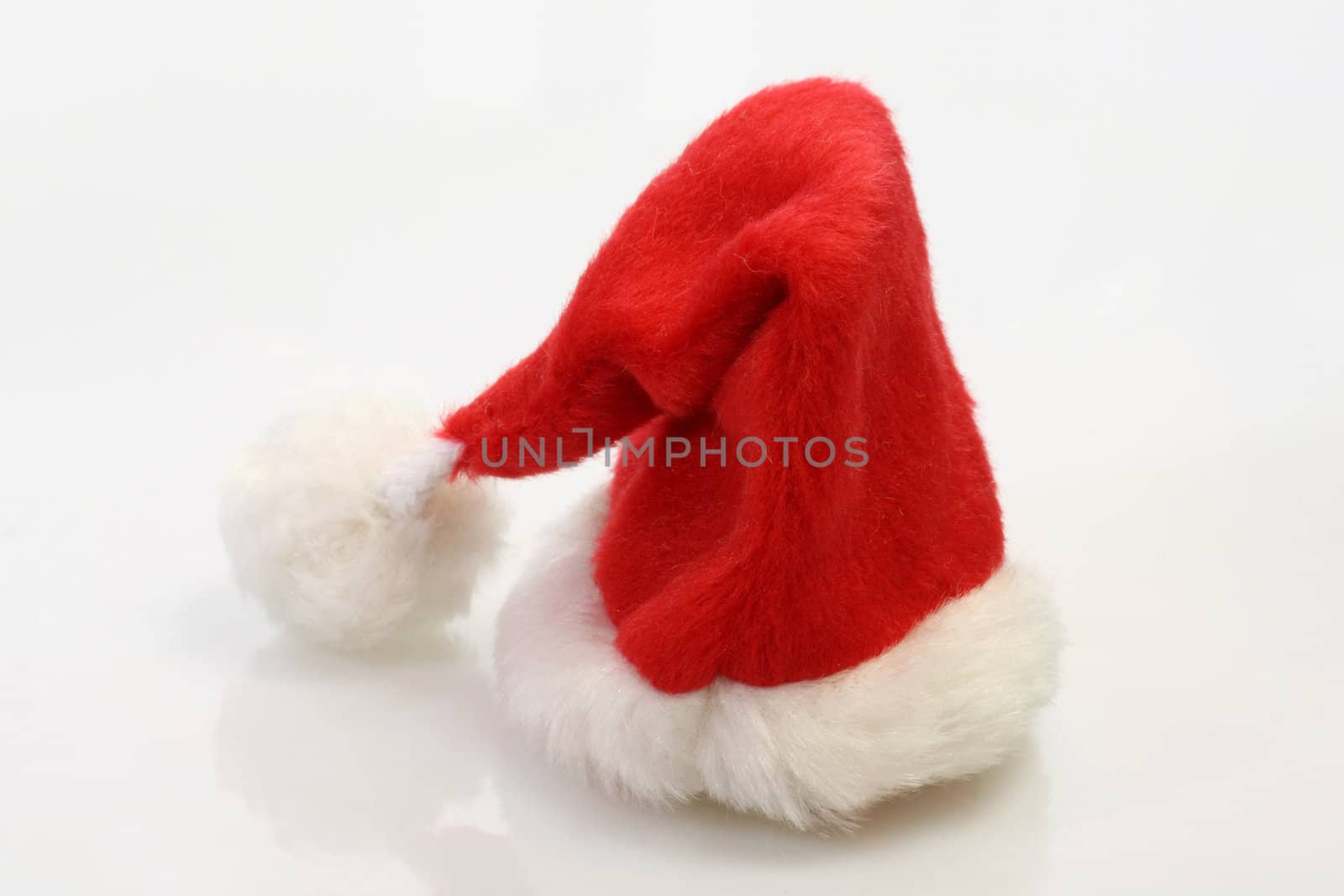 A Christmas Santa Claus hat on a white background