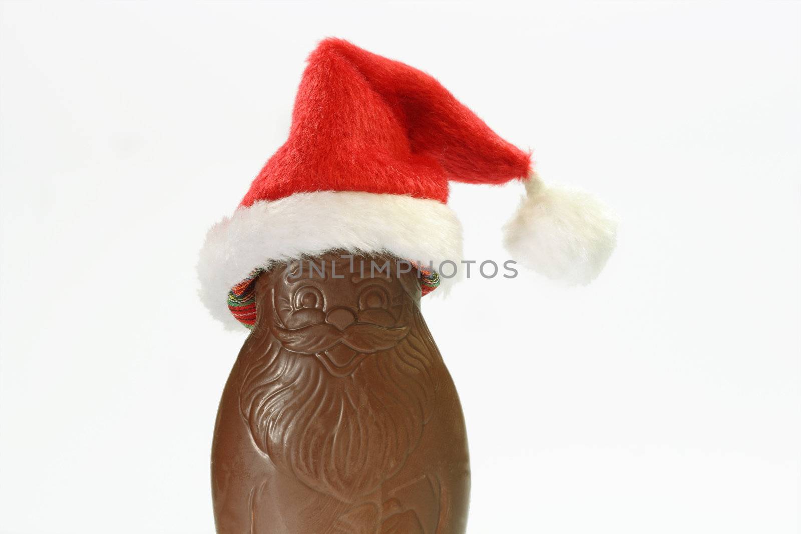 Santa claus with hat made of chocolate. 
