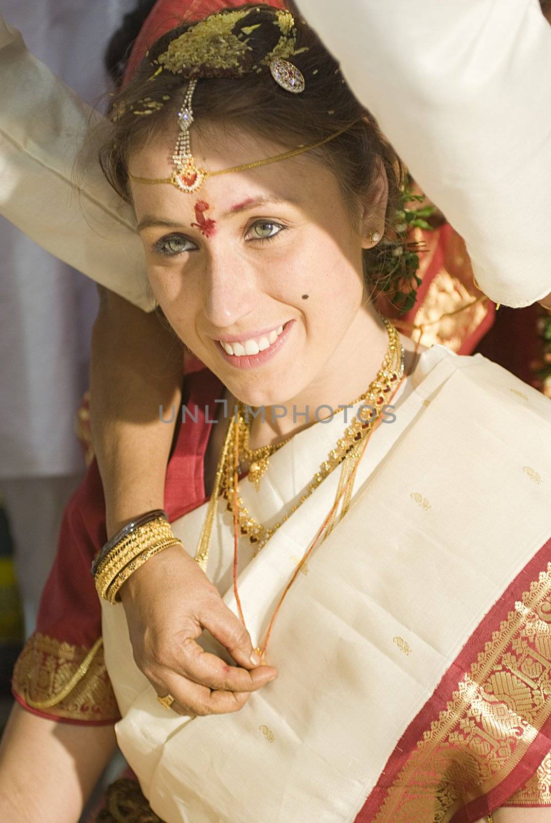 Preparation of european bride to traditional indian wedding