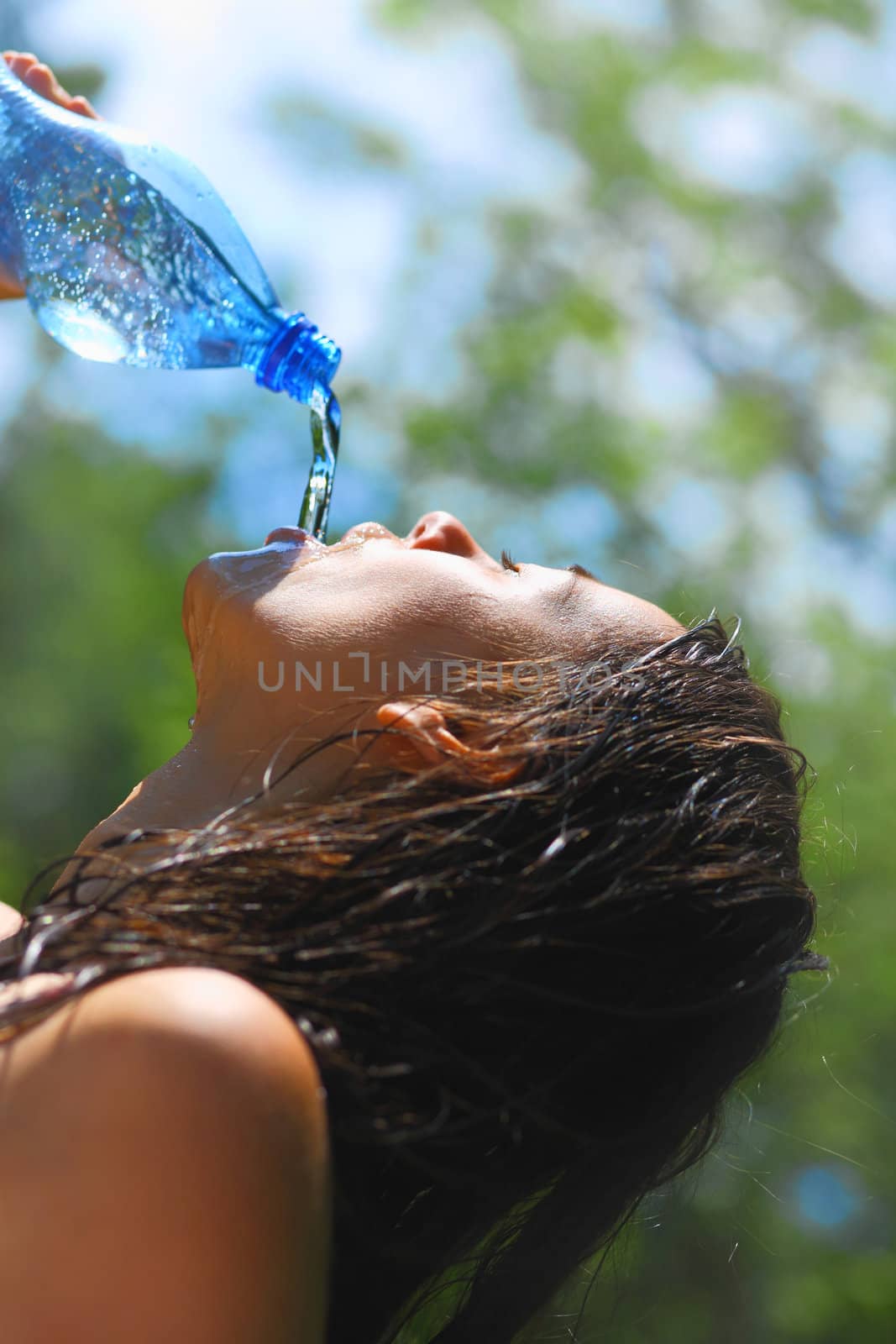 Woman drinking water by romanshyshak