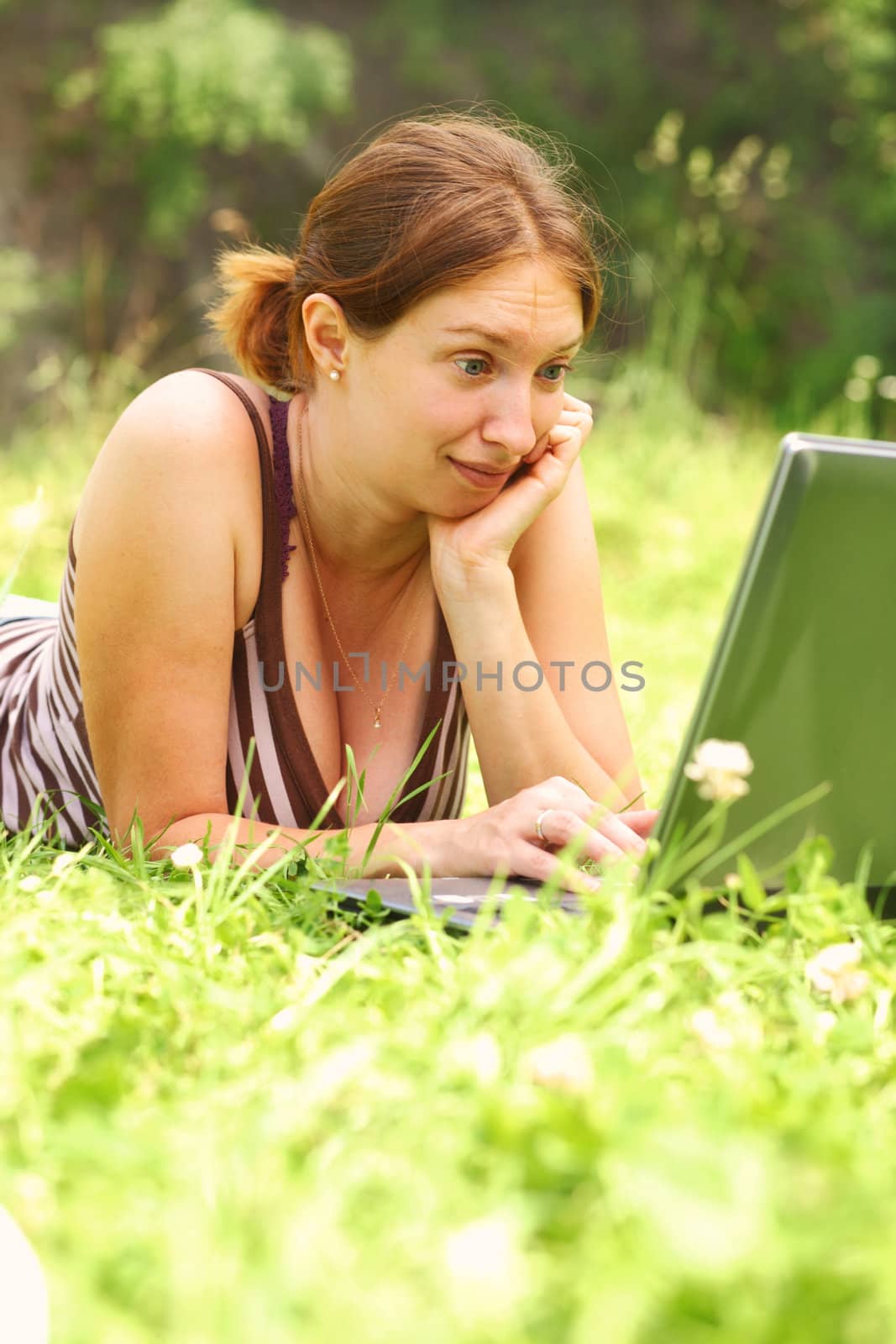 Woman working outdoors by romanshyshak