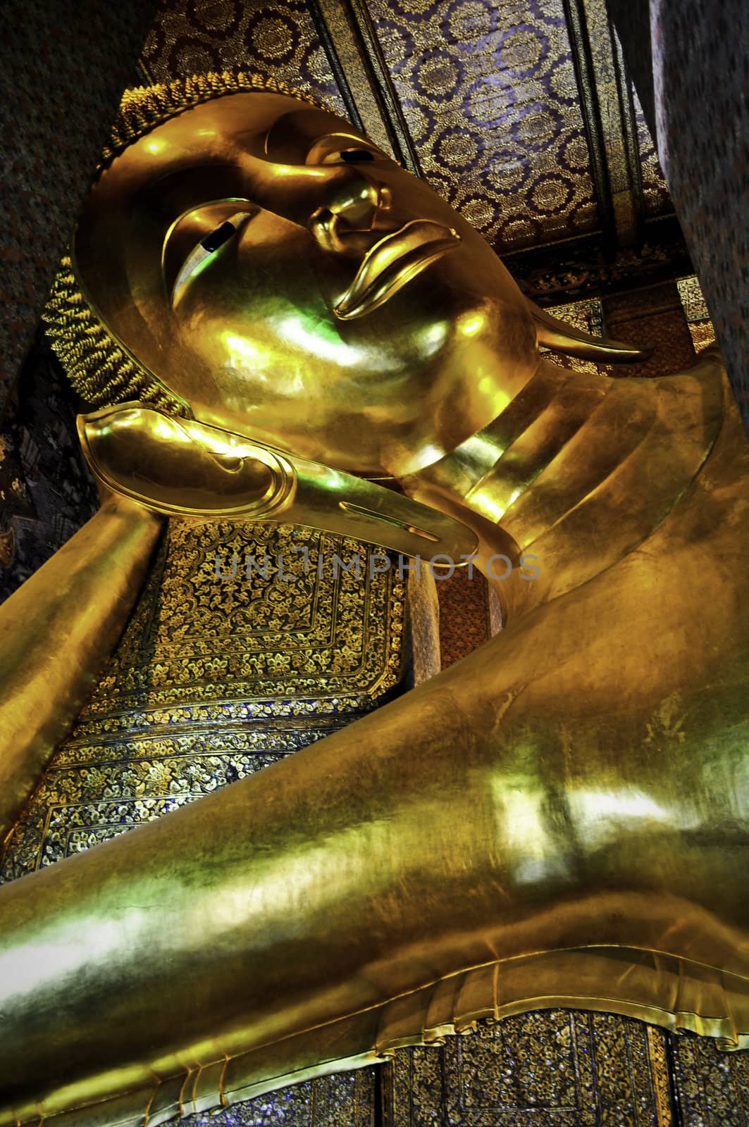 The large famous reclining buddha at a temple in Bangkok