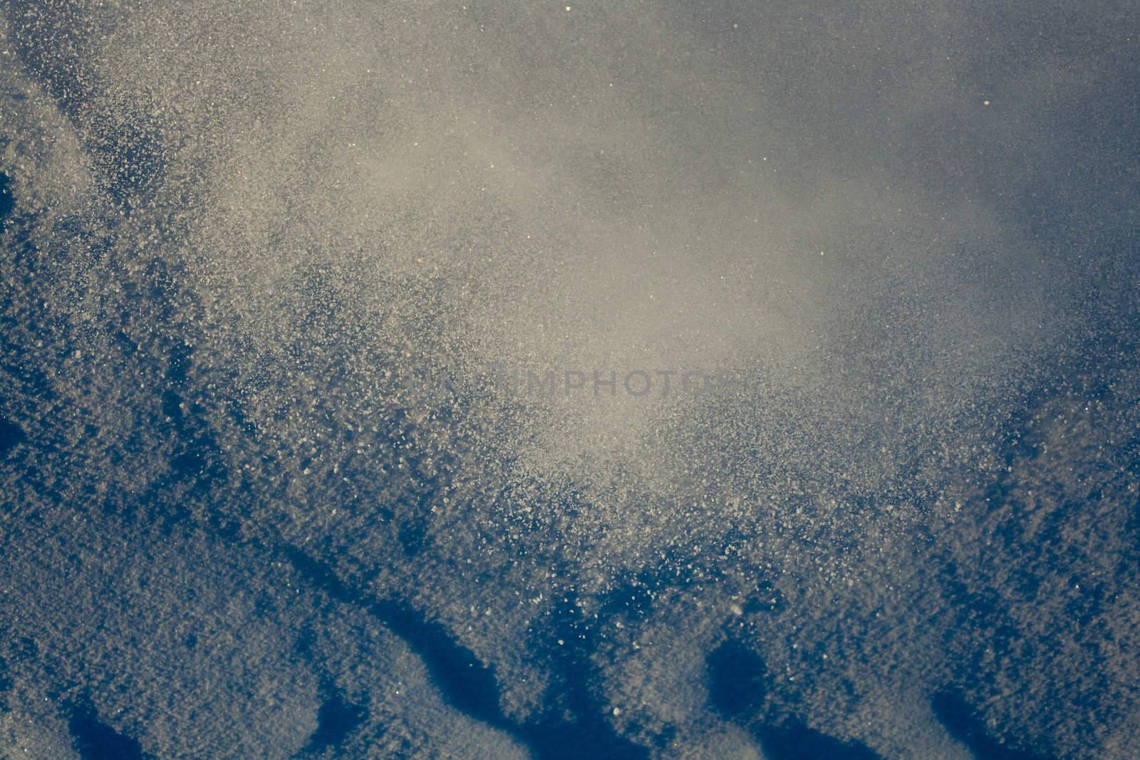 Cloud of powdery snow of approaching avalanche.