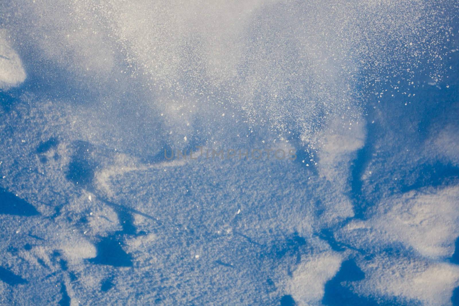 Cloud of powdery snow of approaching avalanche.