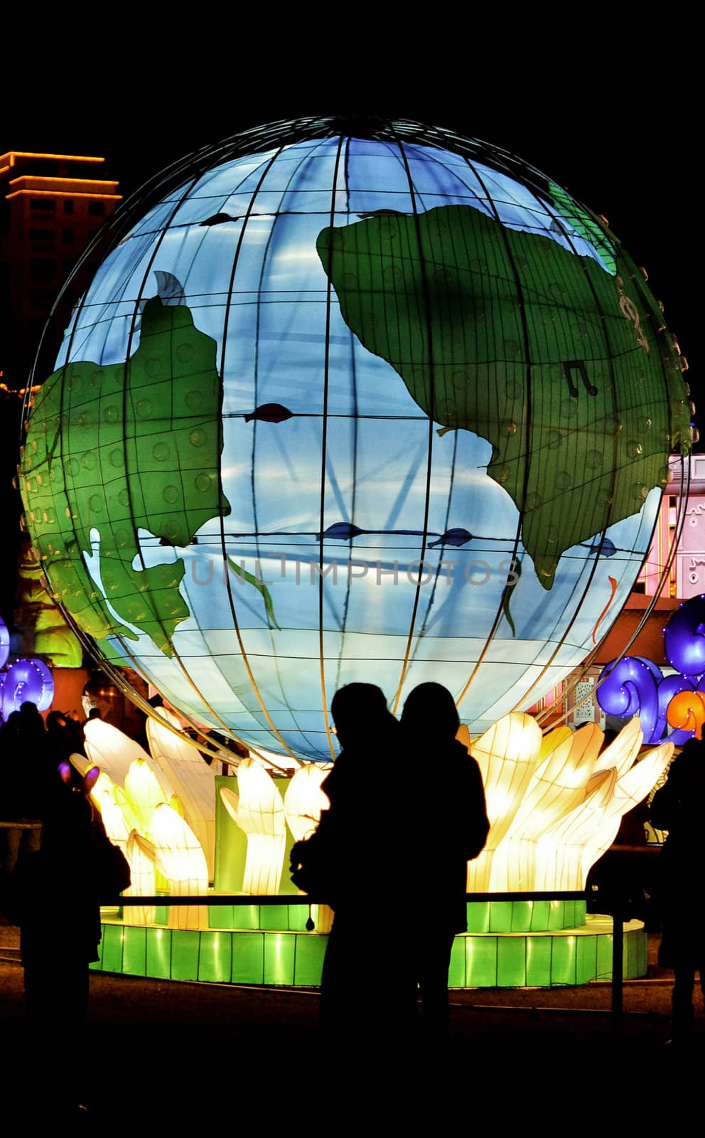 Large globe lantern at night in an asian park