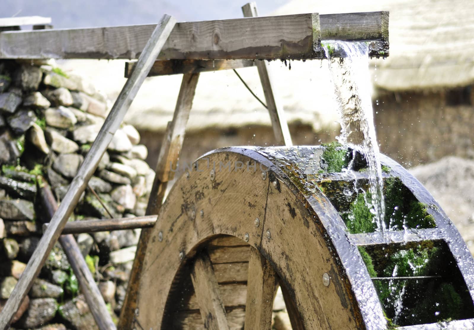 Traditional waterwheel working in a cultural village