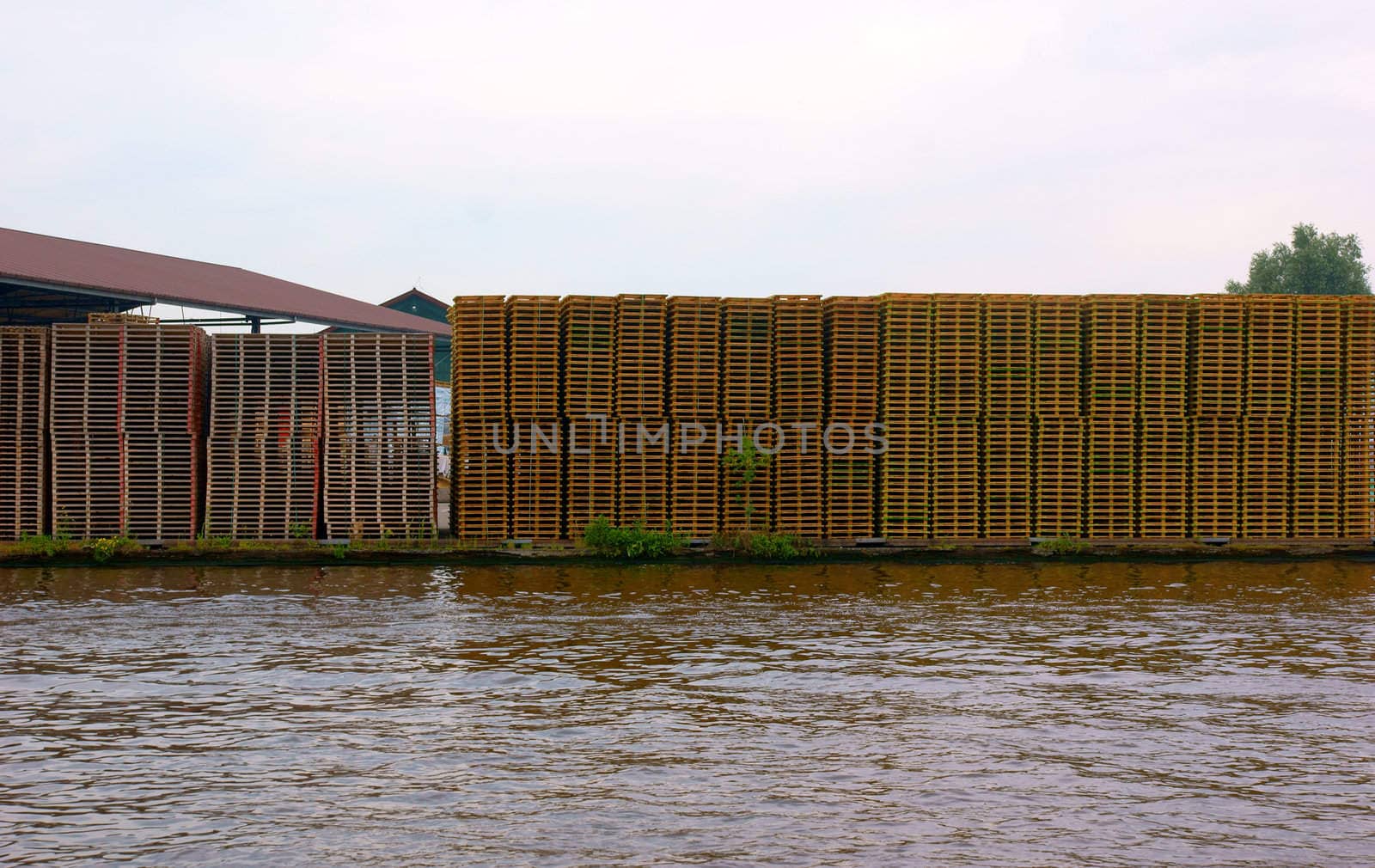 A wall built with wooden pallets