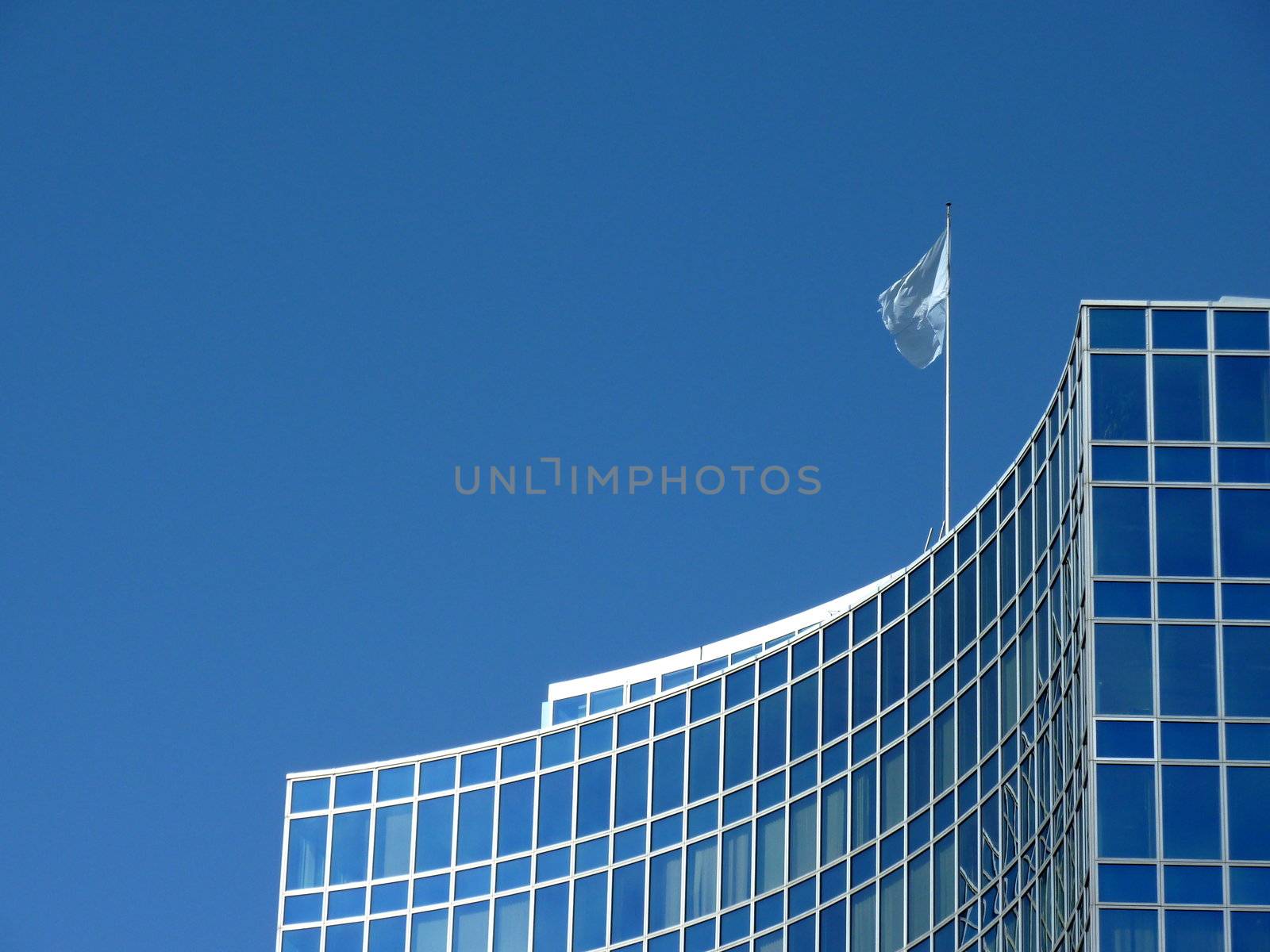Modern building with United Nations flag by beautiful weather