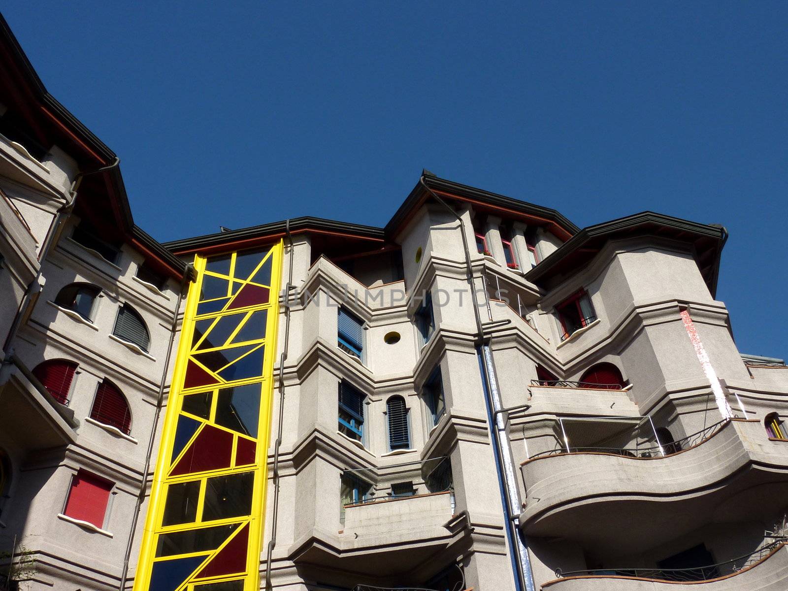 Facade of an eccentric building by beautiful weather