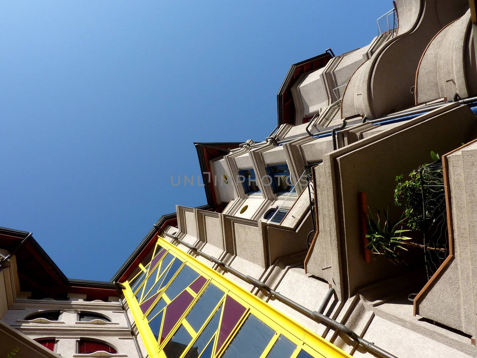 Eccentric facade of a modern building by beautiful weather