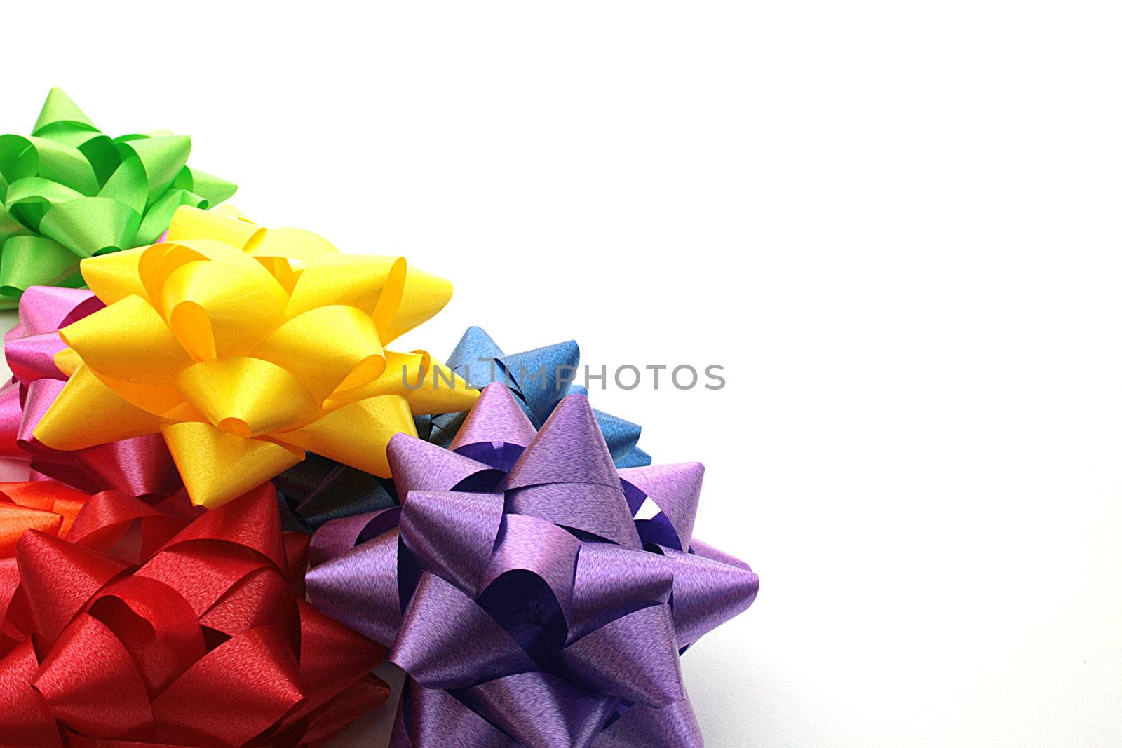 Set of celebratory multi-coloured bows for an ornament of gifts.