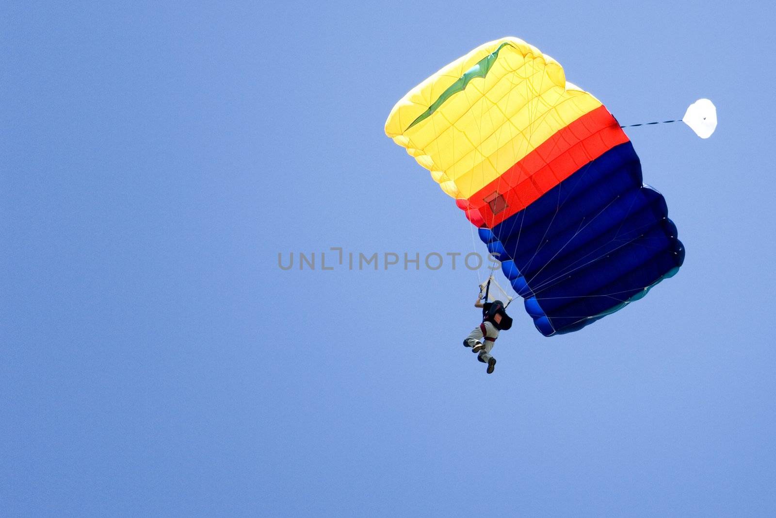 Image of a daring base jumper in action.