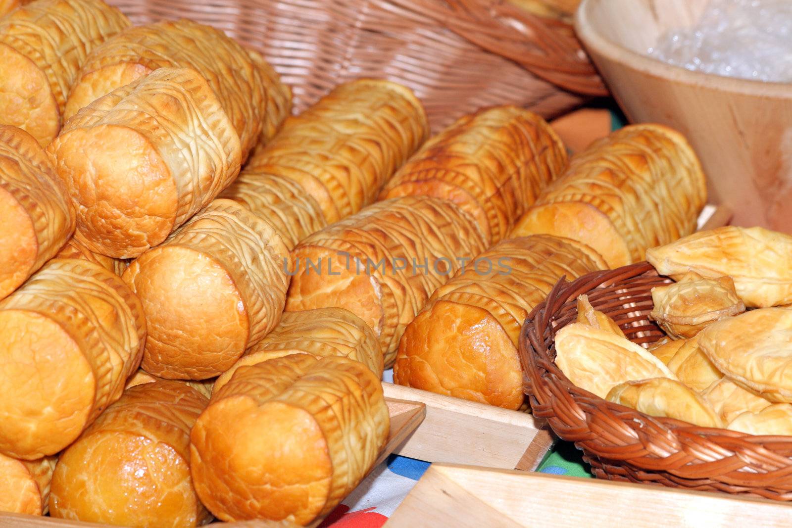 Traditional Polish smoked cheese known as oscypek at the street market
