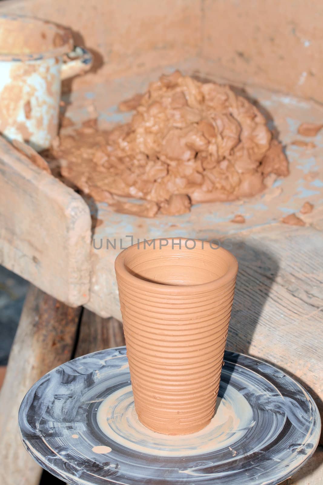 Loam pottery workshop at a market
