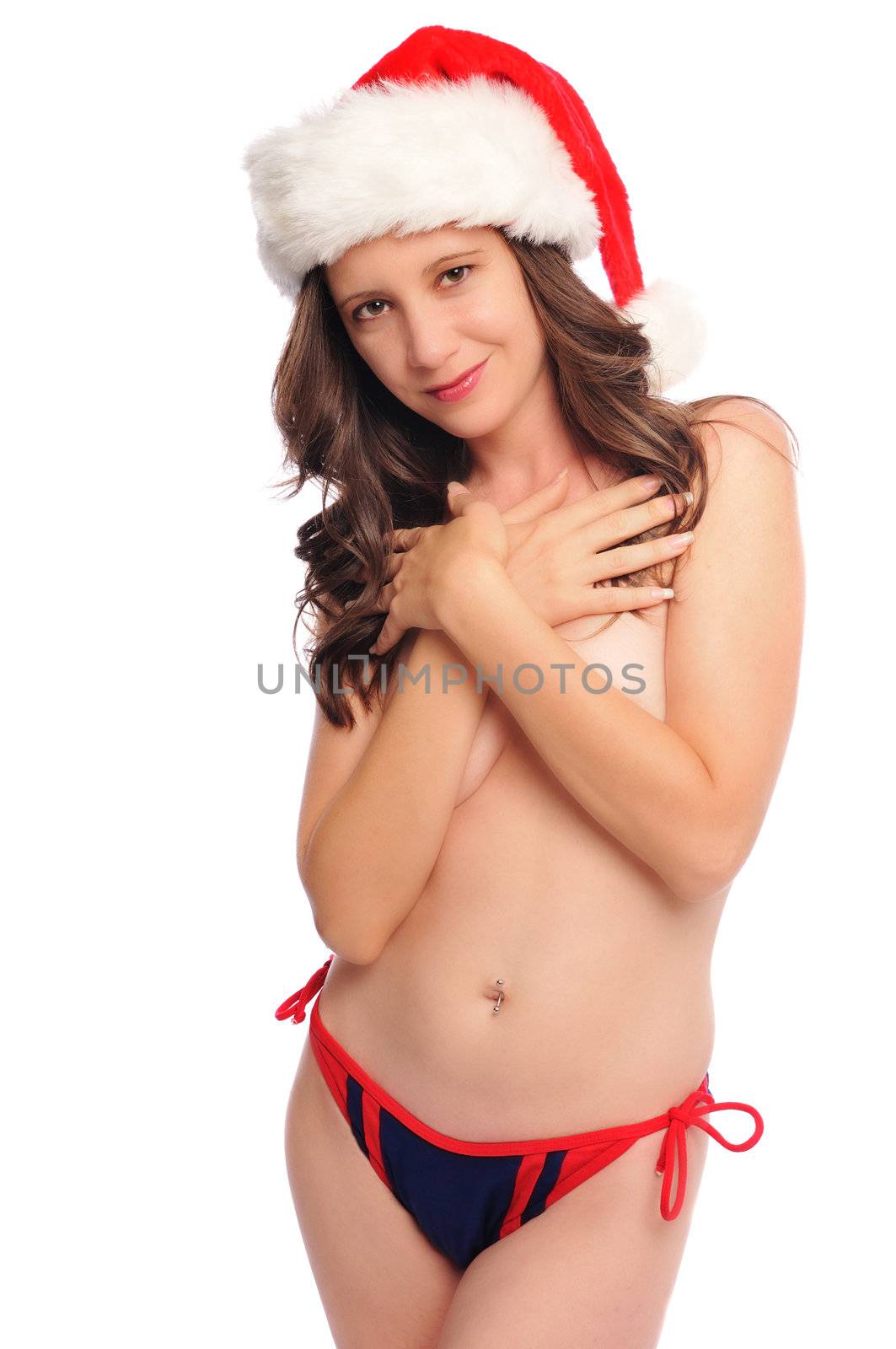 sexy Ms santa in a hat and bikini bottoms only set on white background