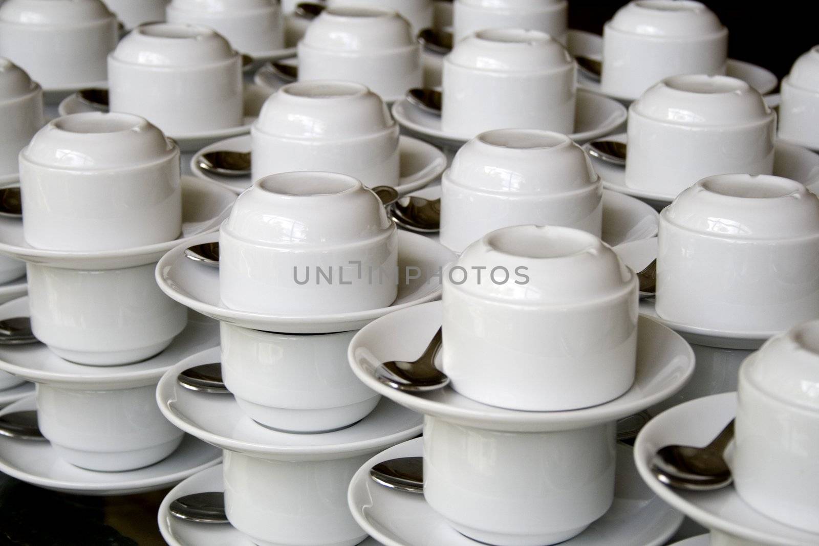 Image of a stack of cups and saucers.