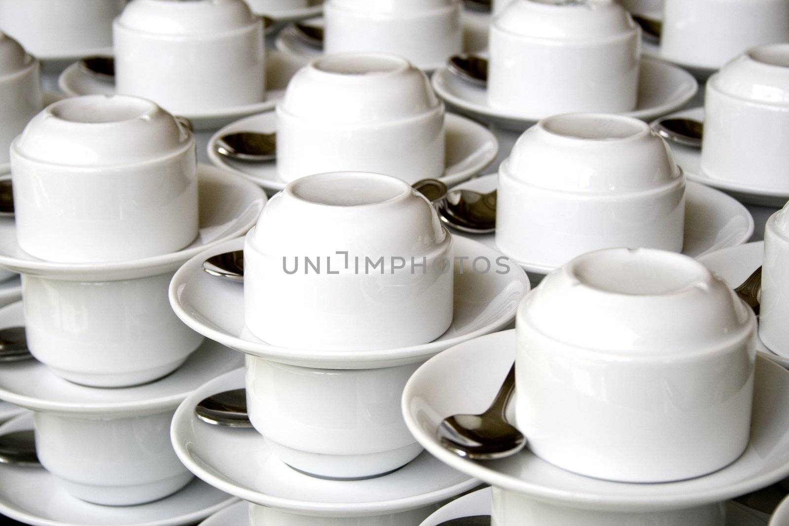 Image of a stack of cups and saucers.