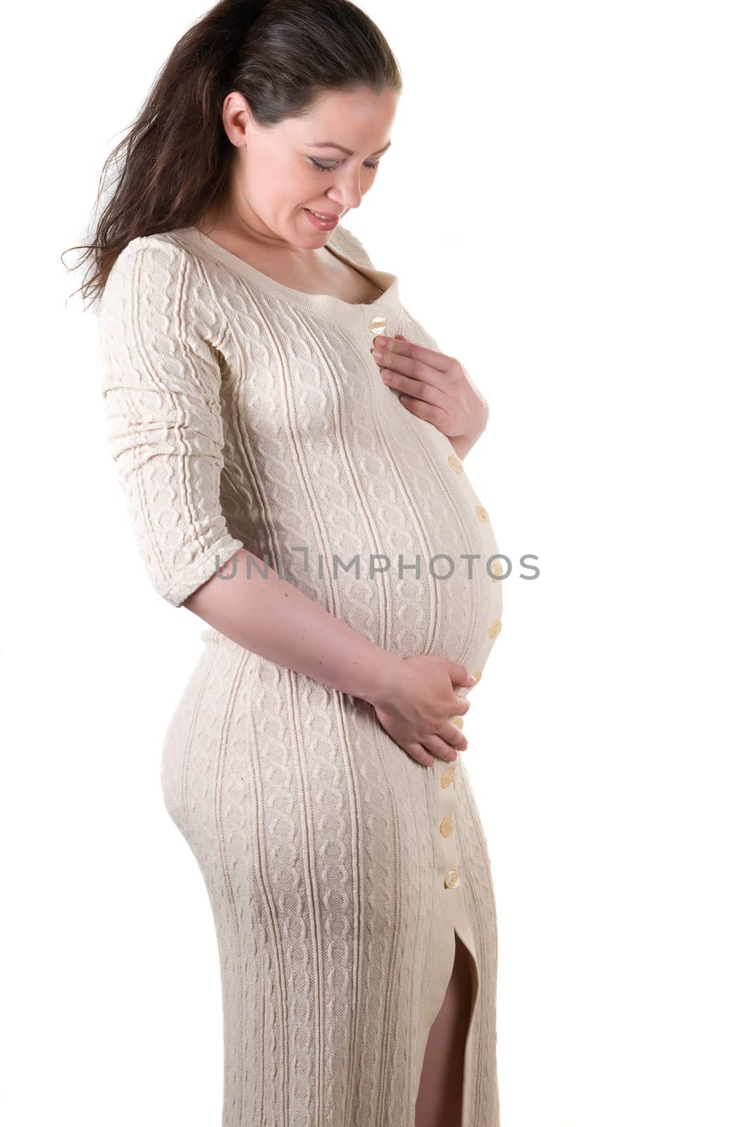 Shot of beautiful pregnant woman isolated on white