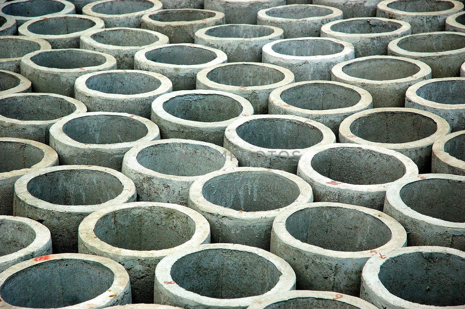 stack of concrete drainage pipes for sewer