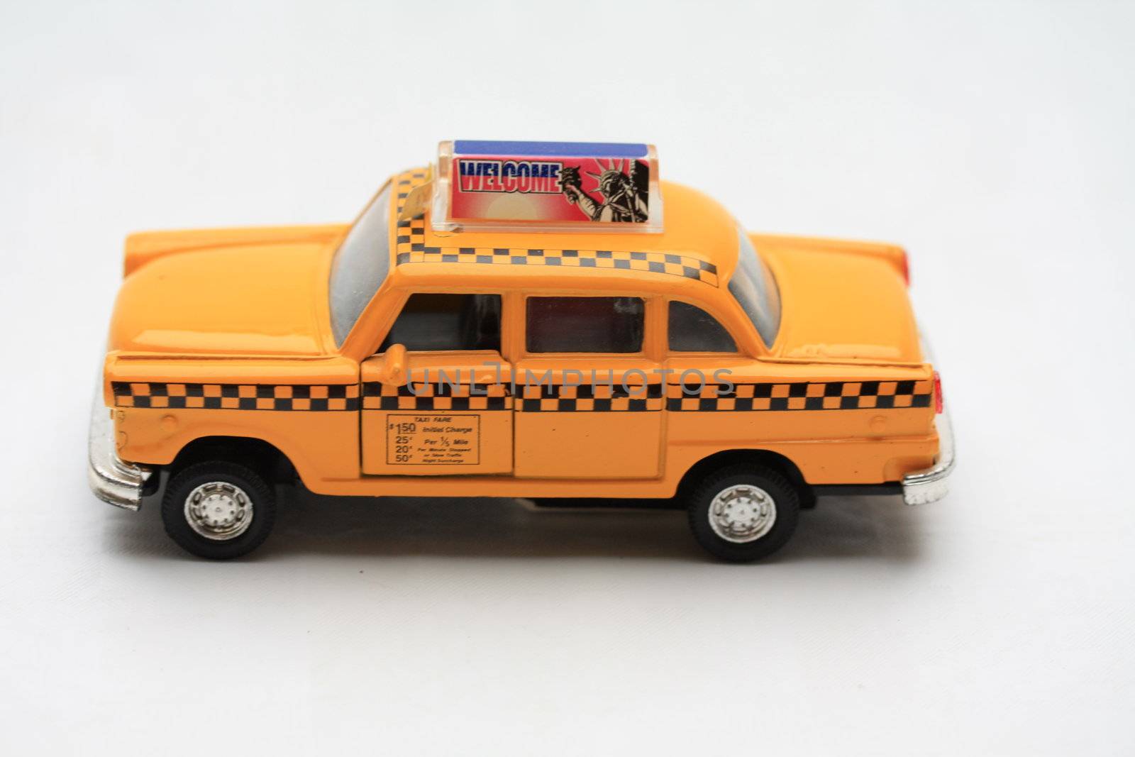New York yellow cab toy car by studioportosabbia