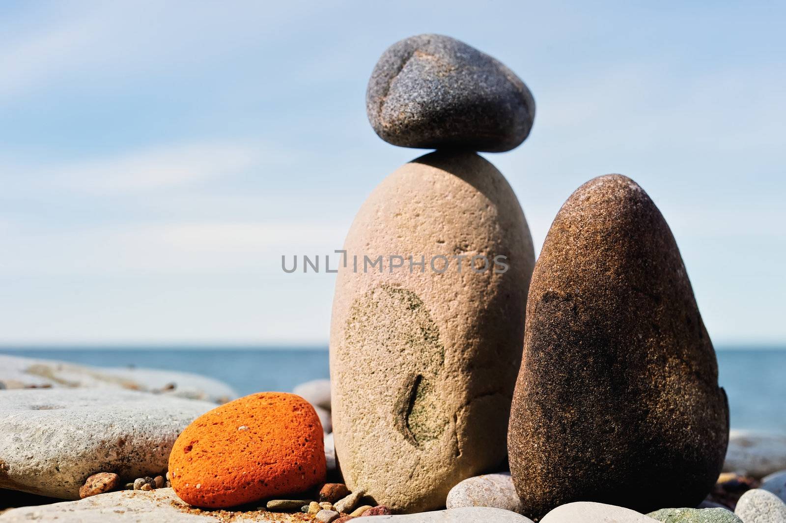 Different color pebble on the sea coast