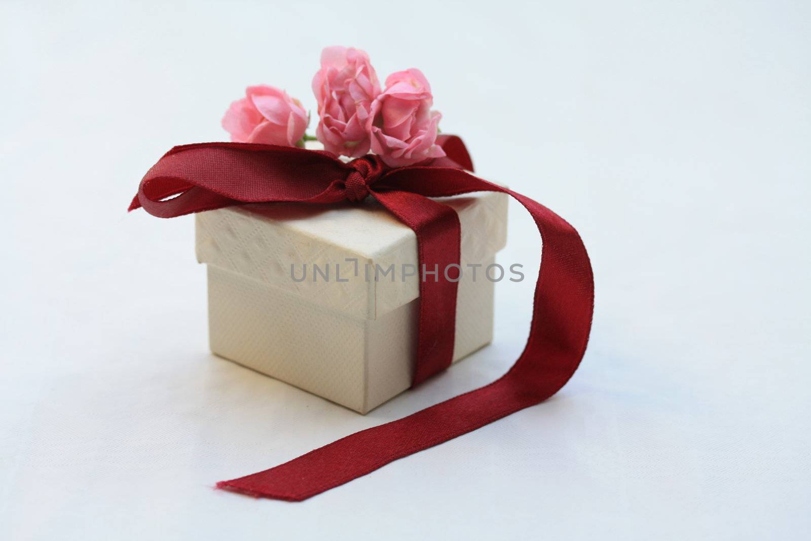 ring box with ribbon and roses