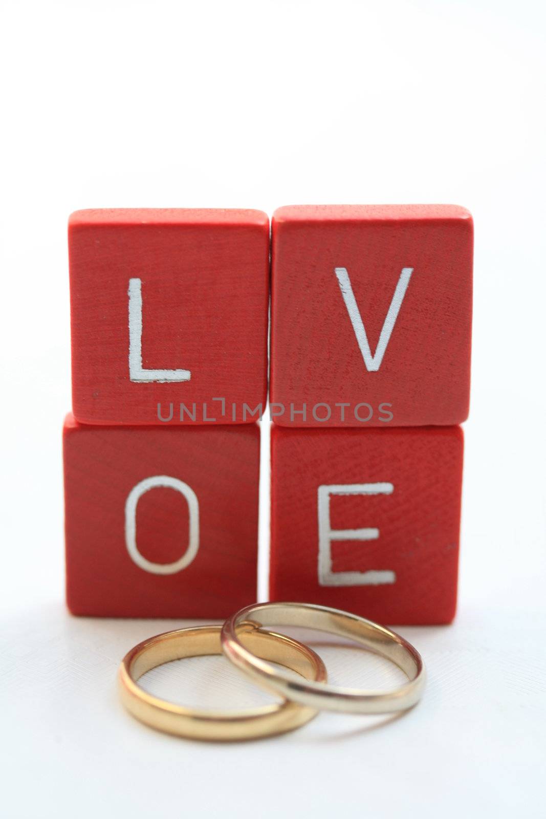 red wooden letters spelling the word "love"