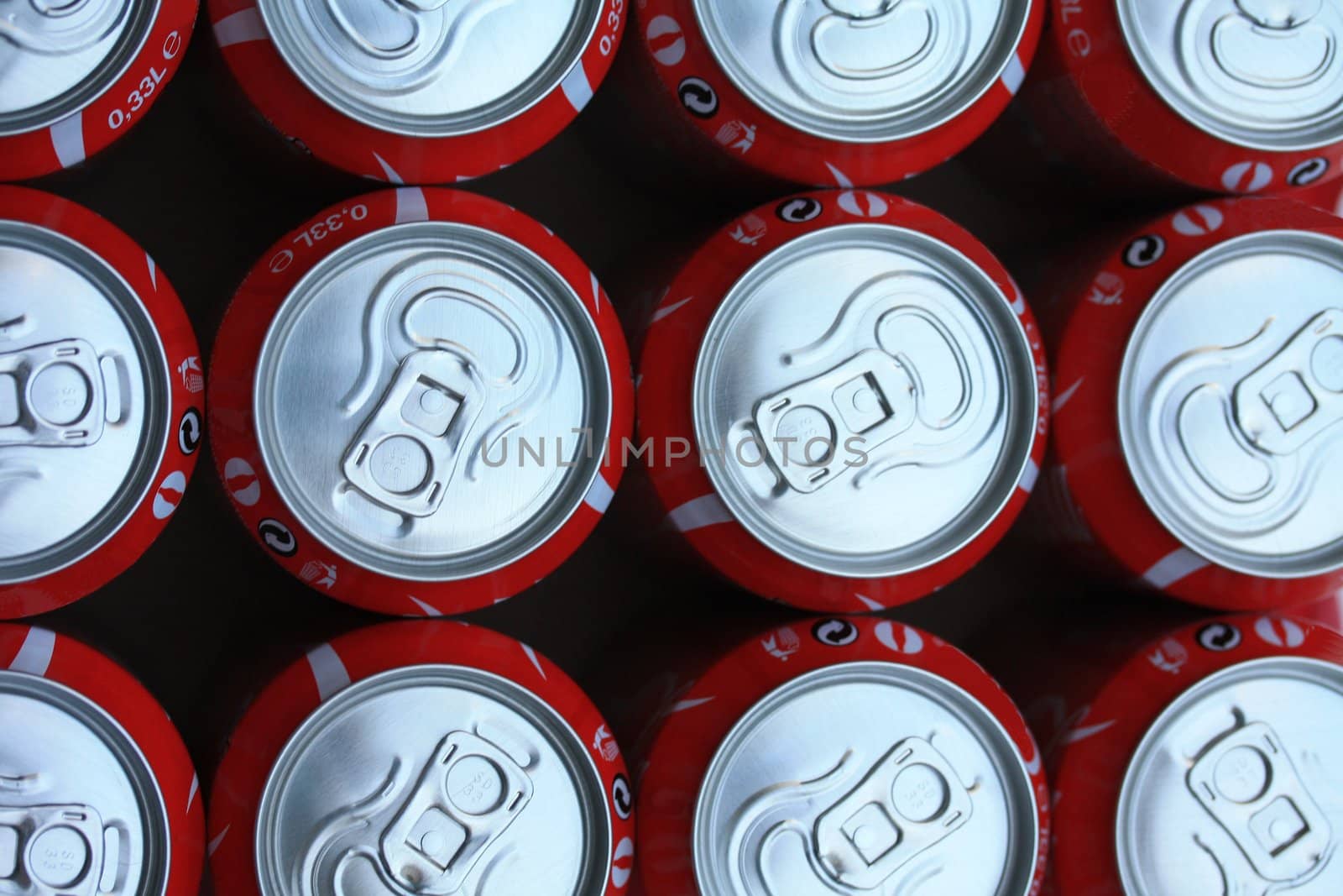 collection of red soda cans